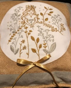 Gold and grey princess embroidery kit review designed by Tamar Nahir Yanai and made by Tracy Balsden bow