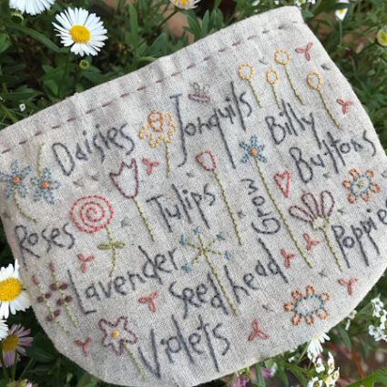 Hatched and Patched Flower Study Purse Pattern by Anni Downs