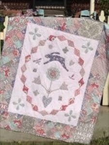 Hatched and Patched Rabbit in the Flowerbed quilt pattern by Anni Downs