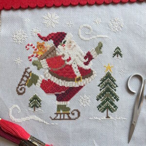 Love Poppet Skating Santa Christmas Cross Stitch on Aida